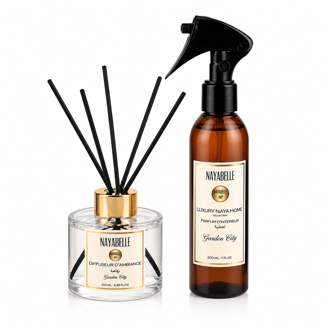 Duo parfumant Nayabelle 'Garden City' comprenant un diffuseur d'ambiance de 100 ml avec tiges noires et un parfum d'intérieur de 200 ml en flacon spray. Un ensemble élégant pour créer une atmosphère fraîche et luxueuse dans votre maison.